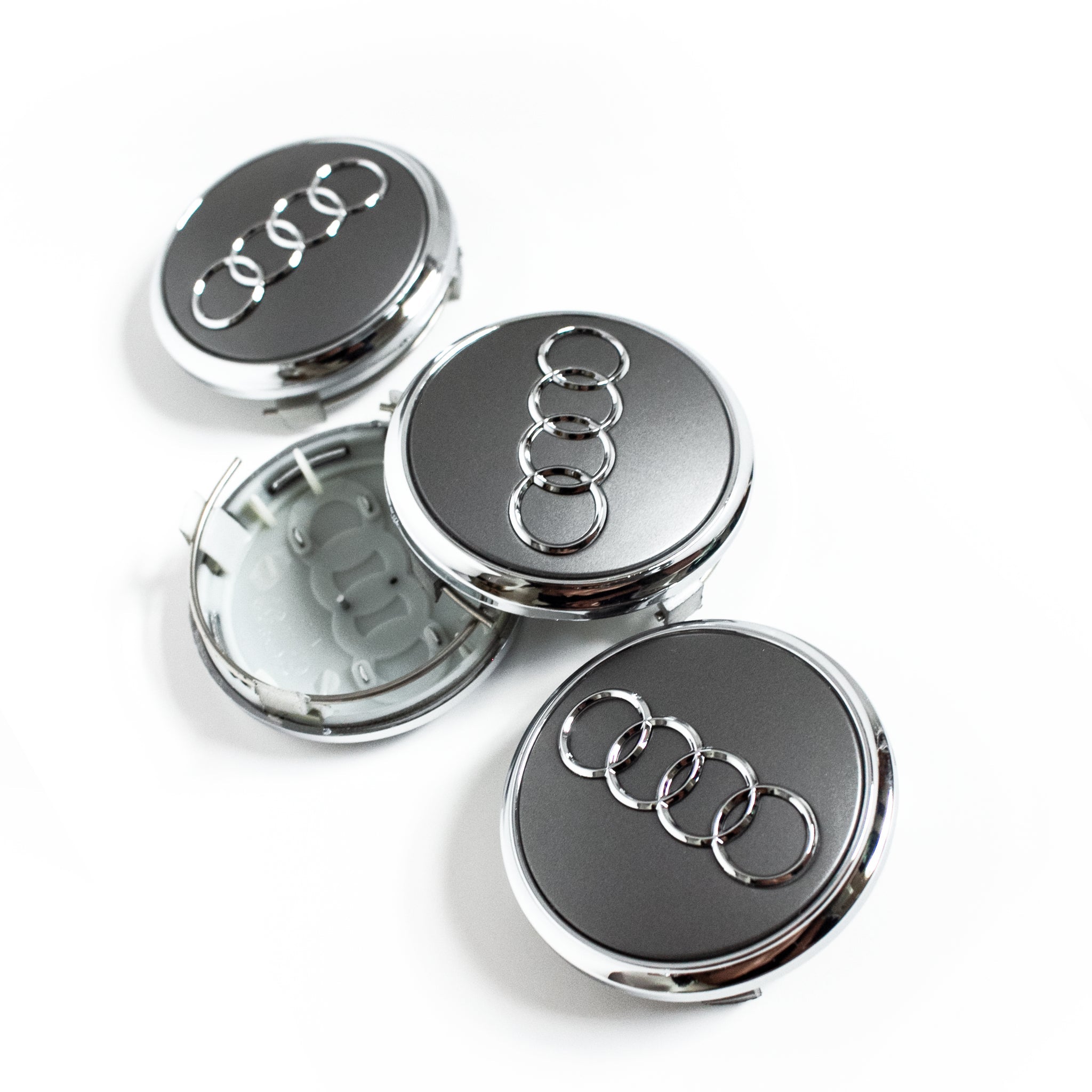 Audi ratlankių dangteliai 69mm pilkos spalvos kaip originalūs montavimo pusė